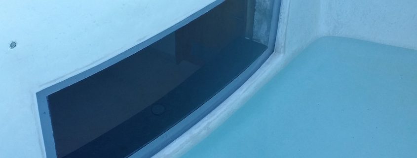 Final repaired acrylic pool window.